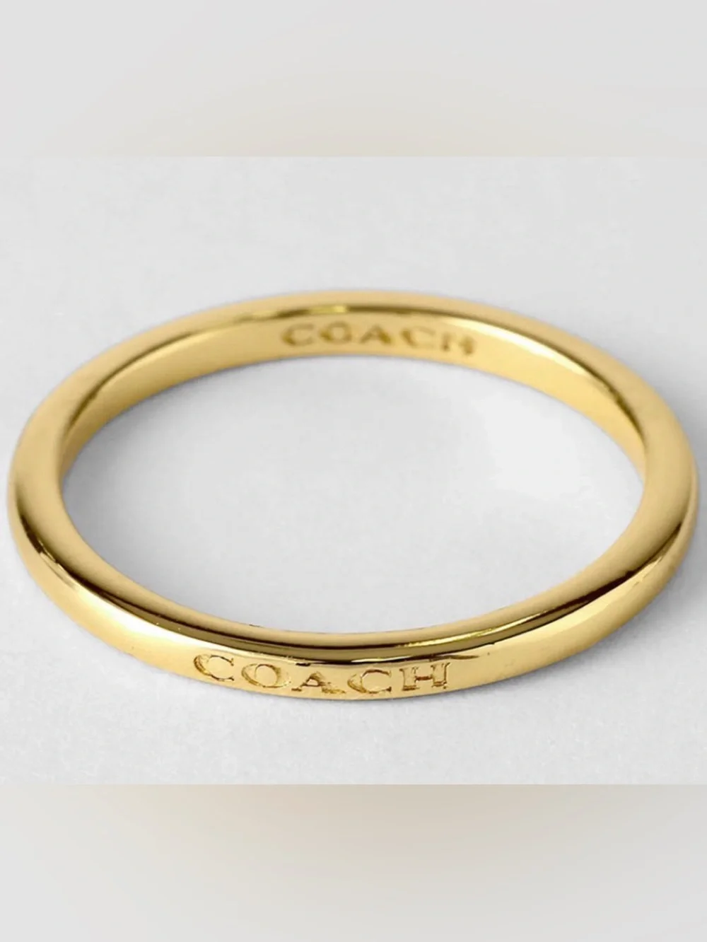 Coach Gold Tone Signature Slim Bangle Ring